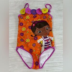 DISNEY doc mcstuffins 5/6 ✨ Kids Orange one piece Character Swimsuit Y2K